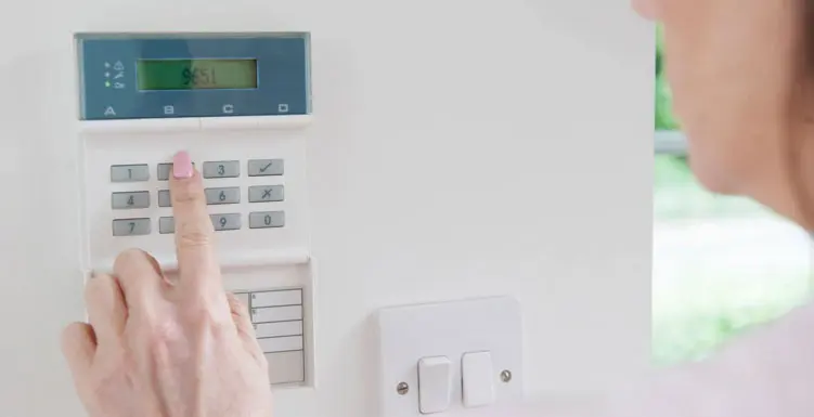 Women operating the home security system